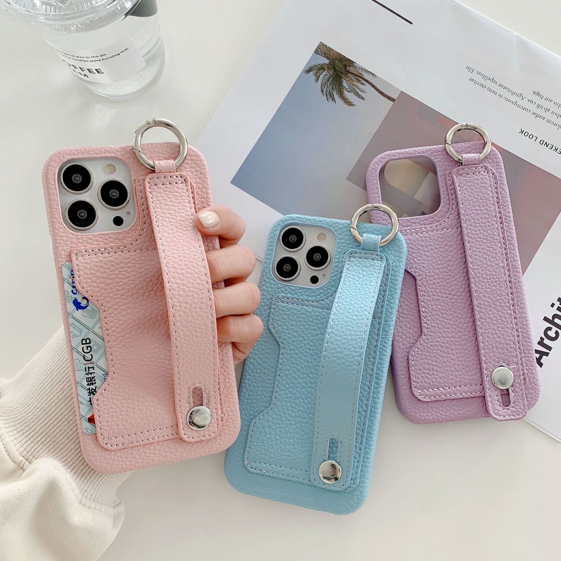 Leather phone case suitable for iPhone, with card slot and wrist strap protection