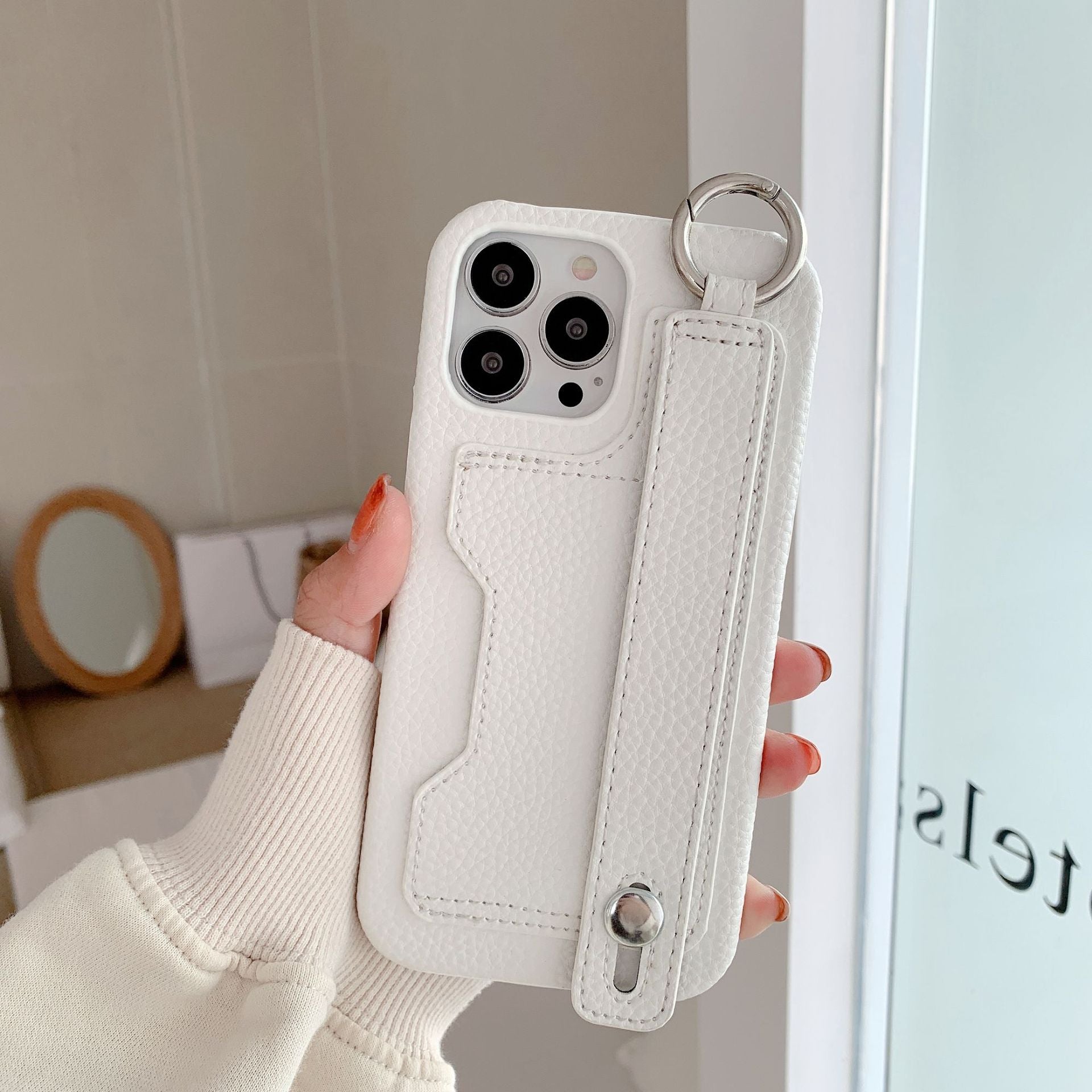 Leather phone case suitable for iPhone, with card slot and wrist strap protection