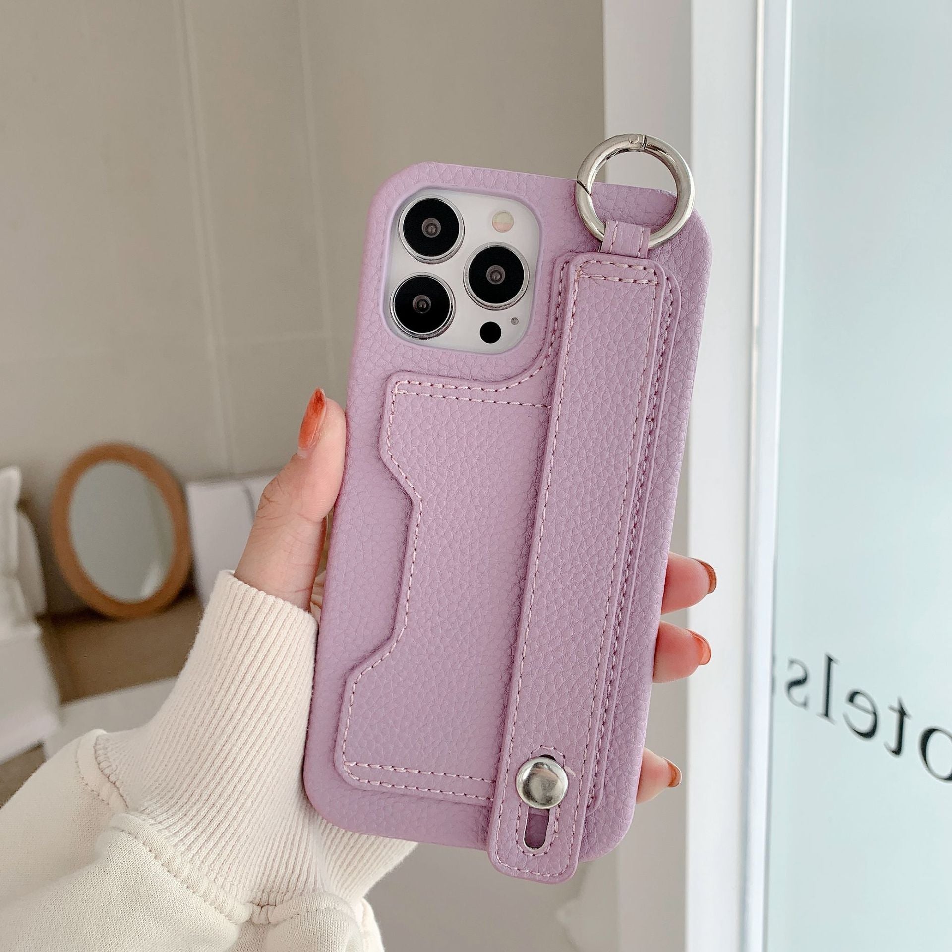 Leather phone case suitable for iPhone, with card slot and wrist strap protection